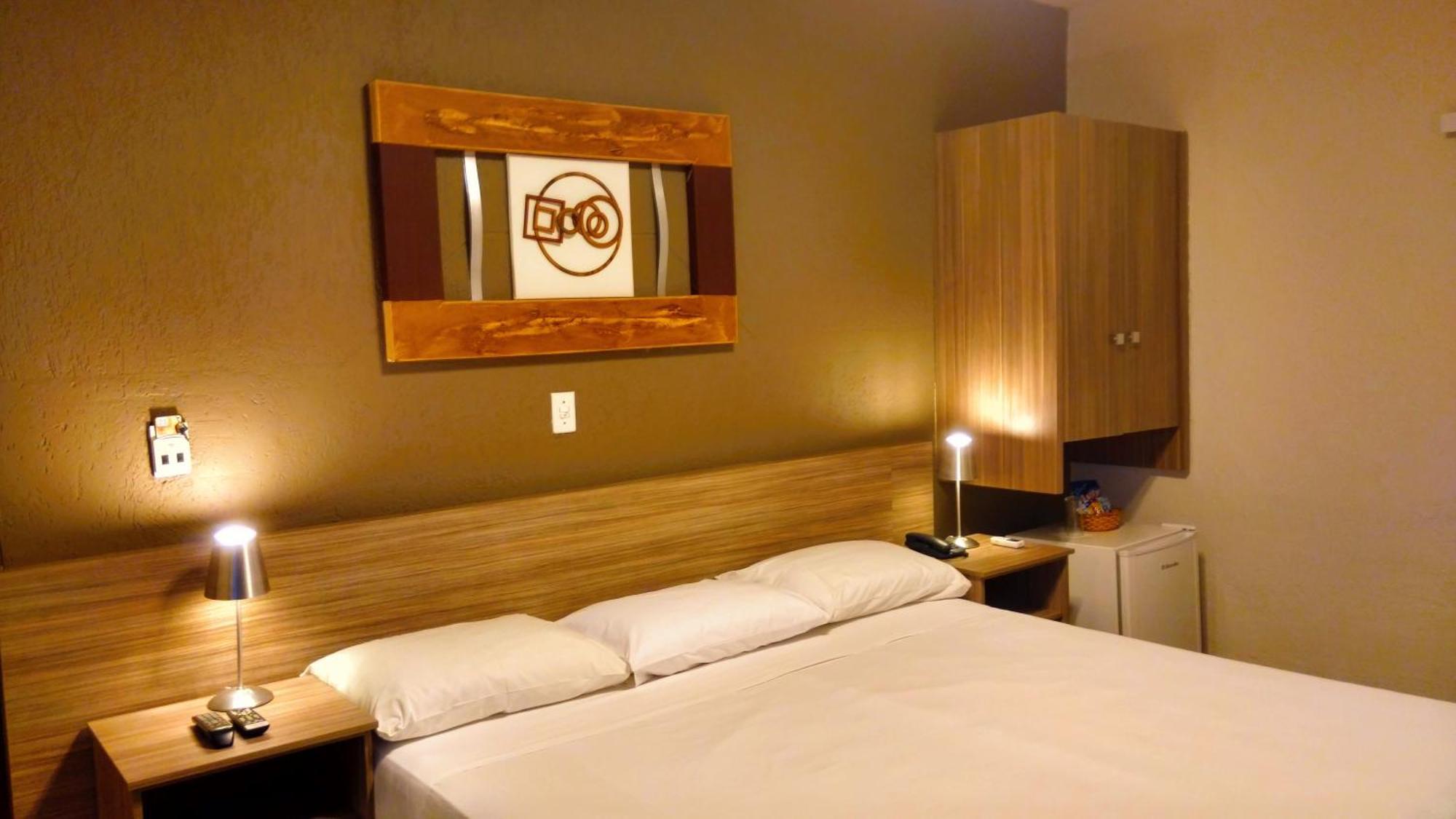 Quarto Standard com Cama de Casal ou 2 de Solteiro
